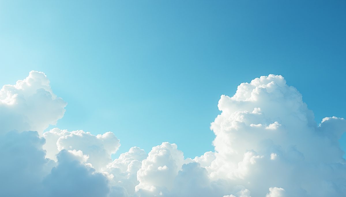 High angle view of a bright blue sky with fluffy white clouds